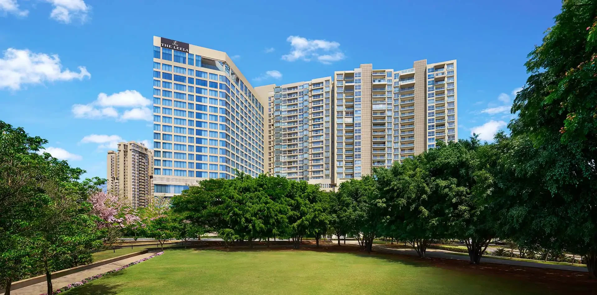 Towers and landscaped lawns at Bhartiya City