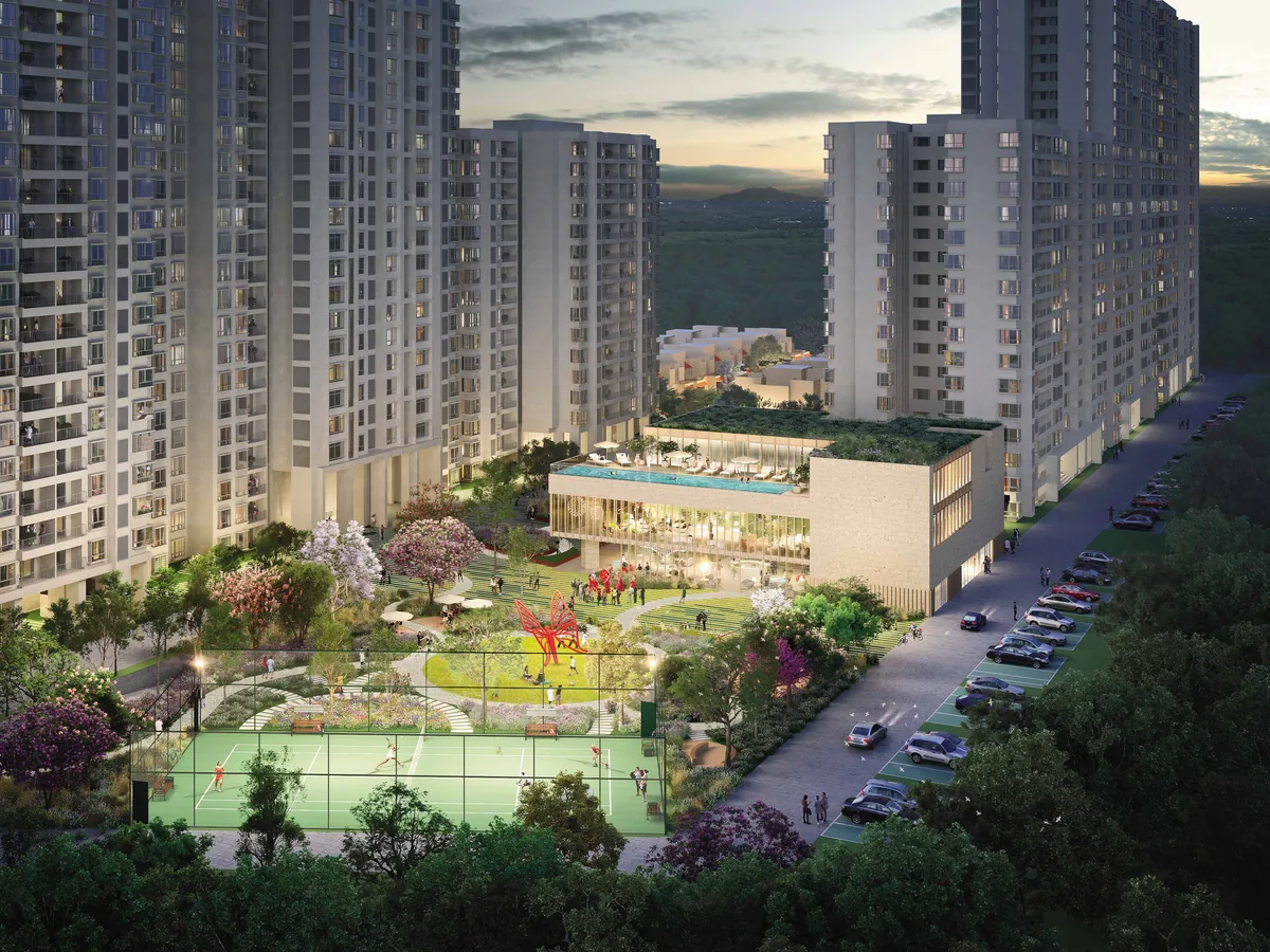 Bhartiya Nikoo Homes 8 towers, the pedestrian Central Spine and the Black Swan Club at dusk, Bellahalli, North Bengaluru